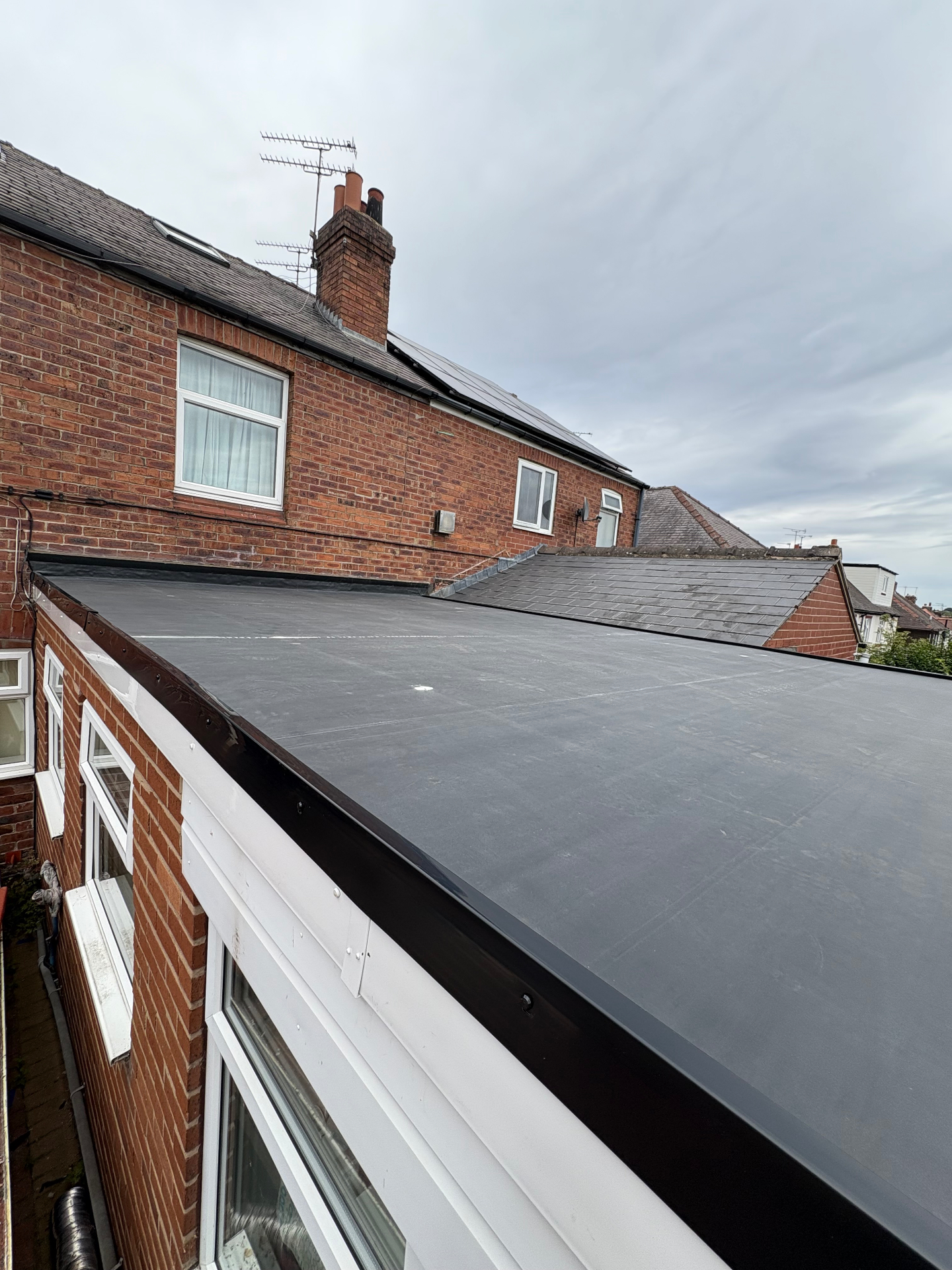 New EPDM rubber flat roof installation